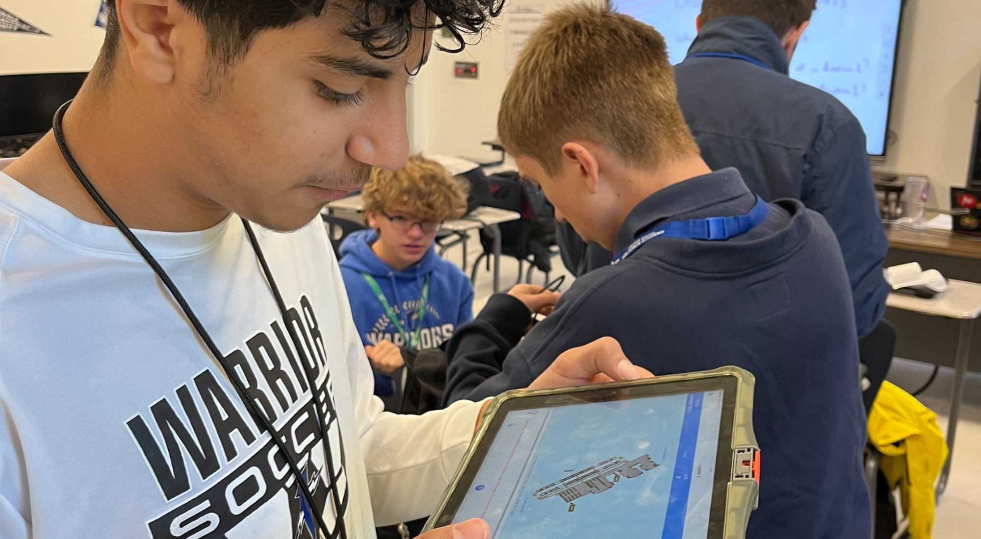 Student pilot practicing aviation radio communication with the PlaneEnglish ARSim app on an iPad in a classroom setting.